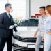 Premium car buyer inspecting a luxury vehicle for fast and convenient selling