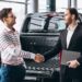 Professional car buyer inspecting a used car before purchase in Dubai