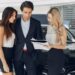 Professional premium car buyers inspecting a luxury vehicle in Dubai for instant valuation and hassle-free selling