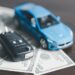 Professional buyer inspecting a used car for fair cash in Dubai
