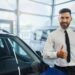 Best car buyers Dubai inspecting a used car before making an offer